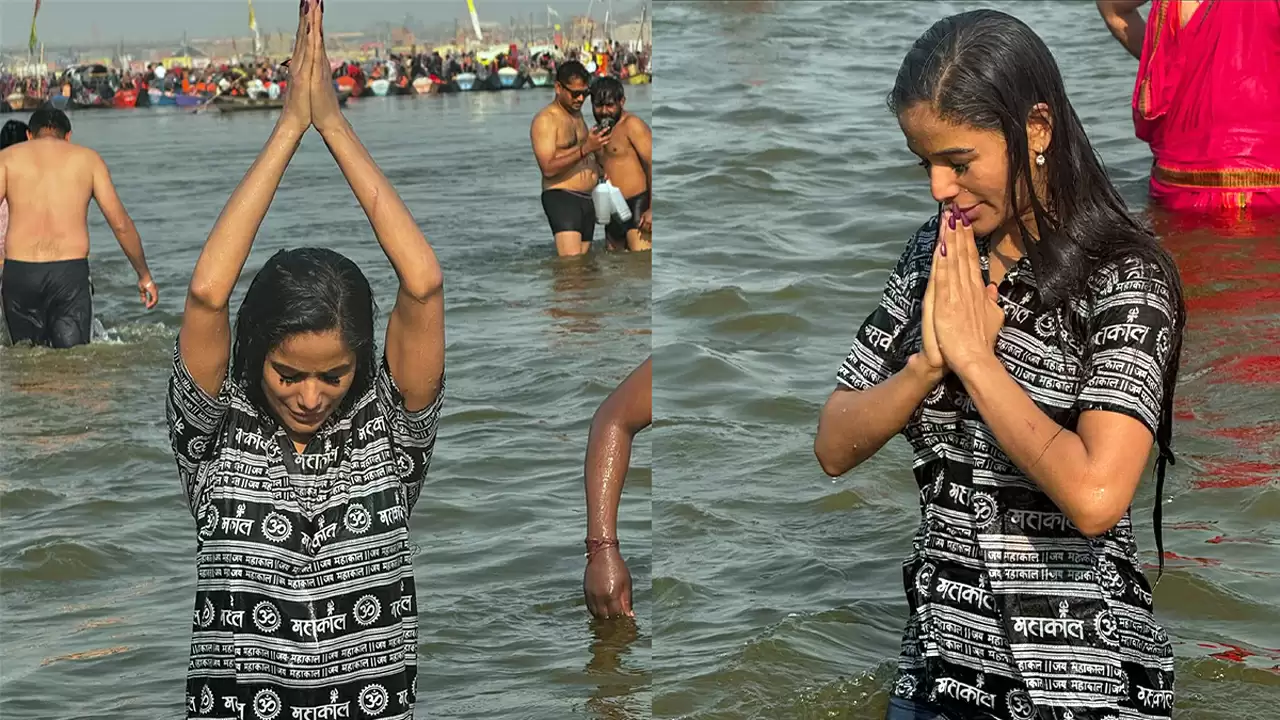 Poonam Pandey at Sangam Ghat